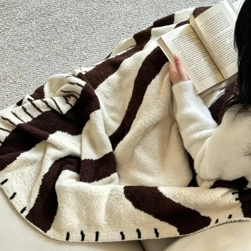 Kuscheldecke – warme Wohlfühlmomente im Wohnzimmer