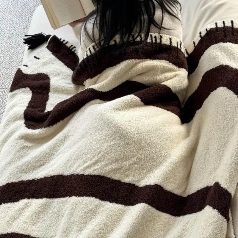 Kuscheldecke – warme Wohlfühlmomente im Wohnzimmer
