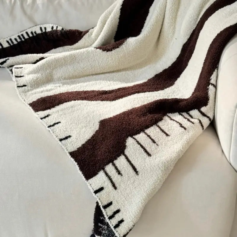 Kuscheldecke – warme Wohlfühlmomente im Wohnzimmer